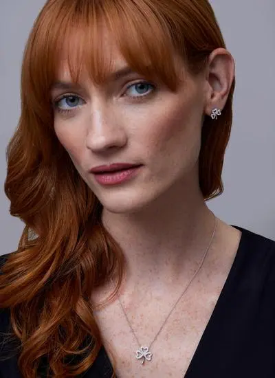 Red haired model wearing Sterling Silver Open Shamrock Pendant With Swarovski Crystals